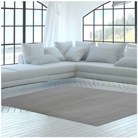 Tapis Ivoire Uni en polyester fait main NEO