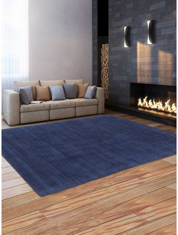 Tapis Bleu Uni en polyester fait main NEO