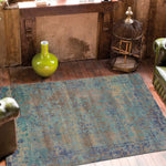 Tapis de luxe motif floral turquoise en laine noué main HERITAGE
